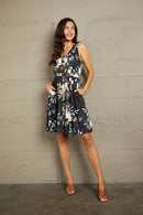 Double Take Printed Scoop Neck Sleeveless Buttoned Magic Dress with Pockets